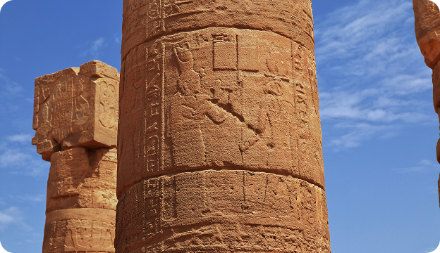 Ancient stone columns representing heritage and foundations